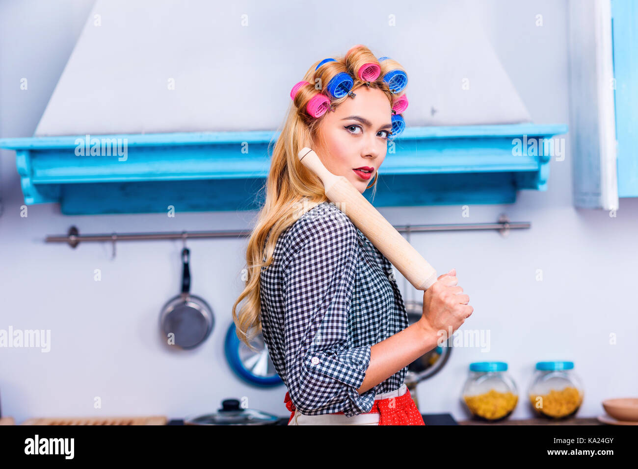 housewife with rolling pin Stock Photo