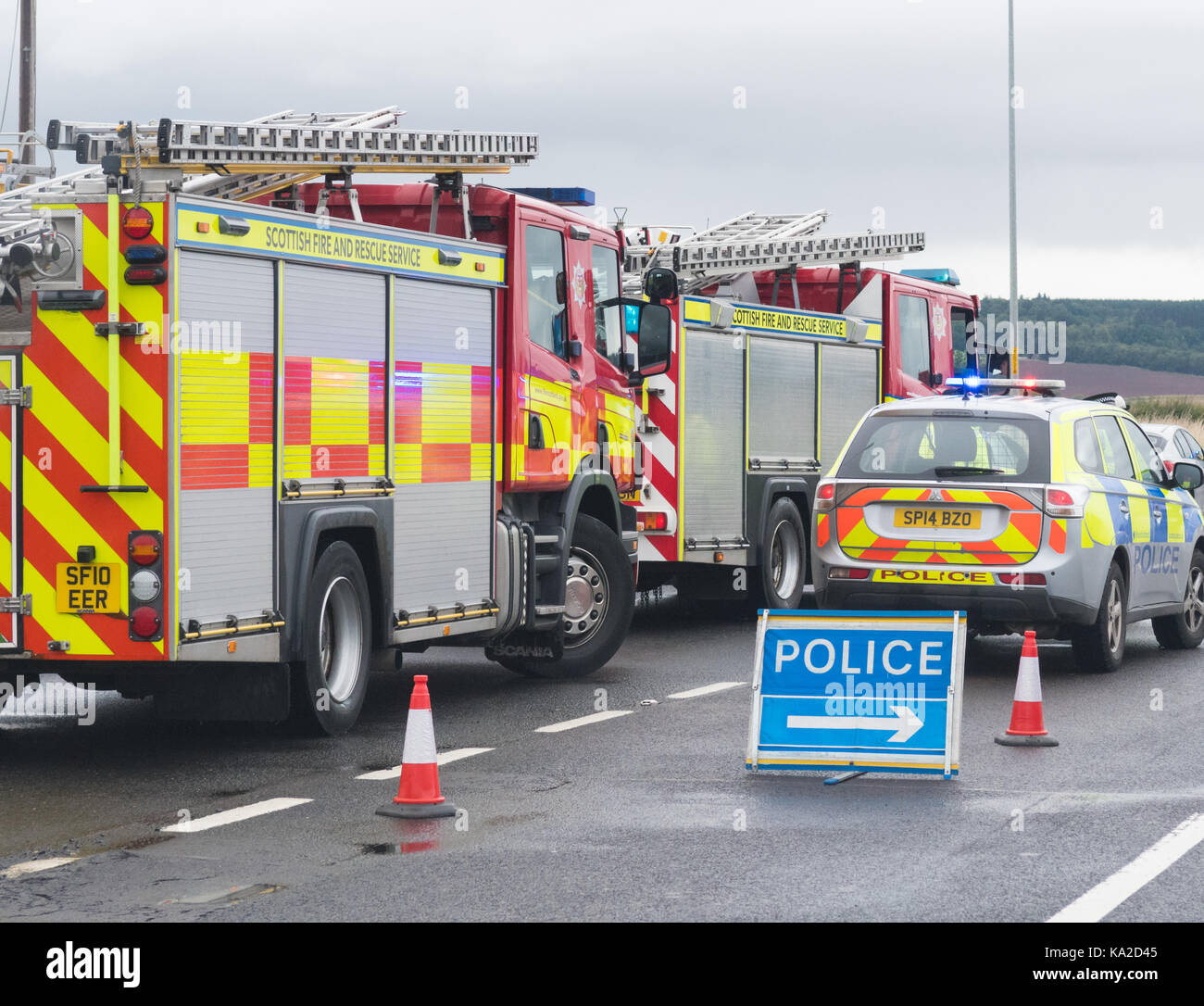 emergency services vehicles at a road traffic accident, Scotland, UK Stock Photo