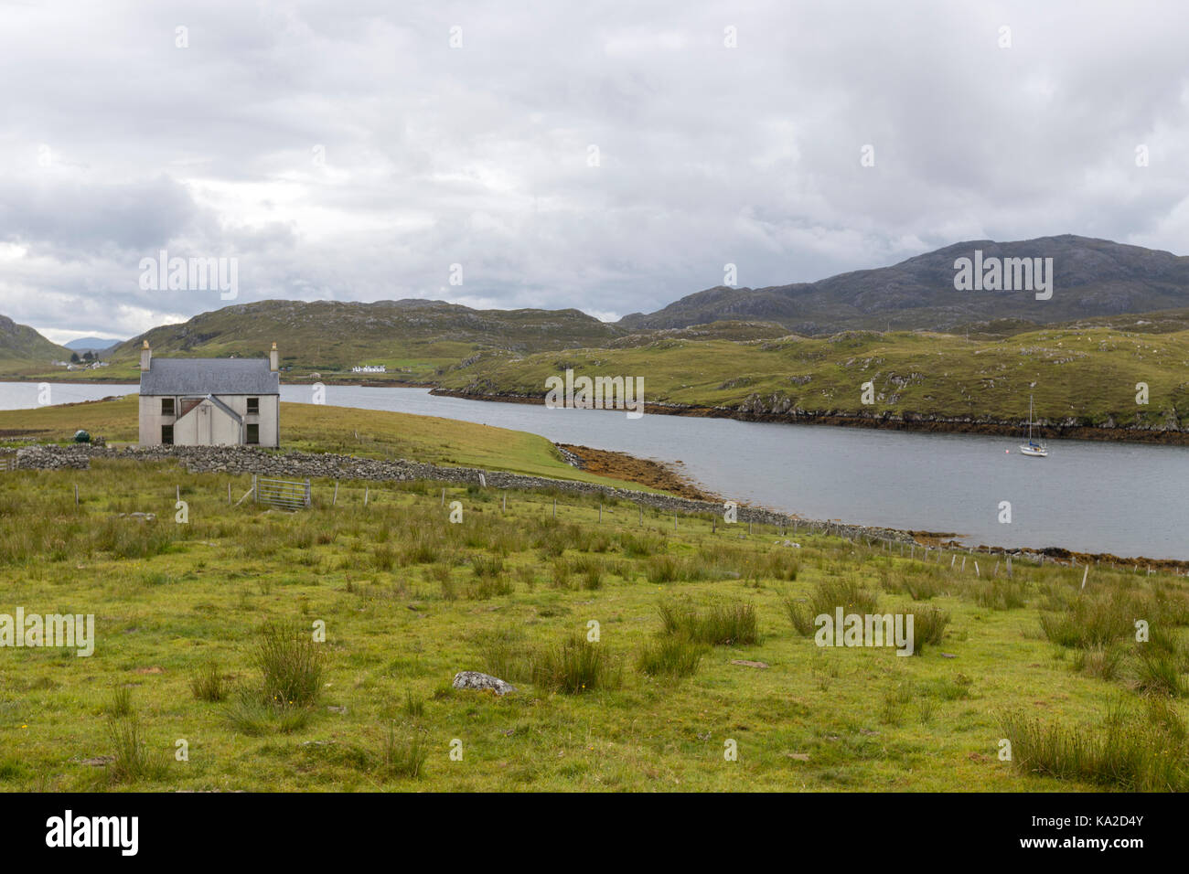 Isolated house overlooking Isle of Lewis, in the Outer Hebrides ...