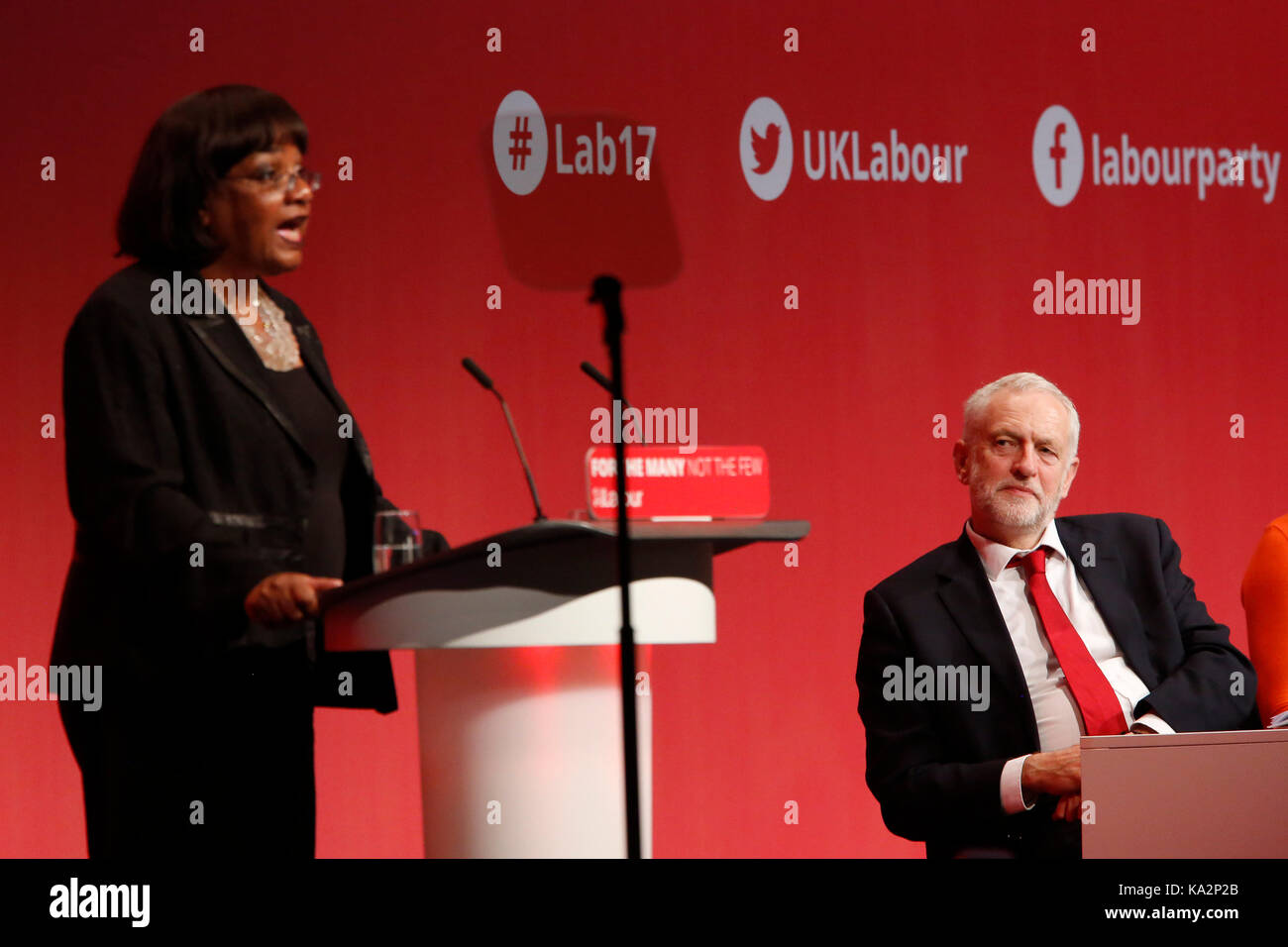 Brighton, UK. 24th September, 2017. Jeremy Corbyn, leader of Britain's opposition Labour party listens to Diane Abbott, Shadow Home Secretary, as she makes a speech during the annual Labour Party Conference in Brighton, UK Sunday, September 24, 2017. Photograph : Credit: Luke MacGregor/Alamy Live News Stock Photo