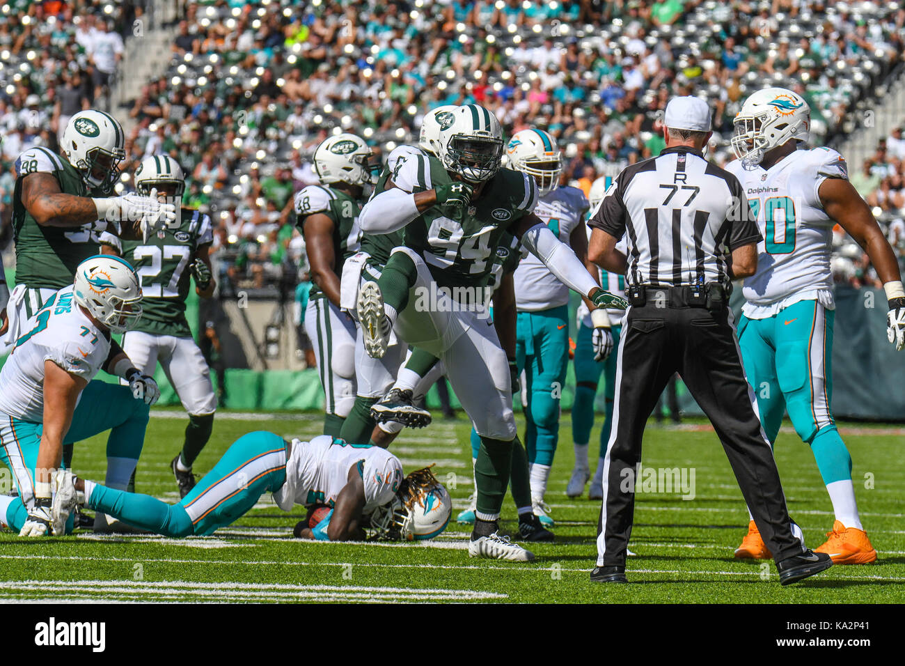 East Rutherford, New Jersey, USA. 24th Sep, 2017. Kony Ealy (94) of the New York Jets reacts after making a tackle during a game against the Miami Dolphins at Metlife Stadium in East Rutherford, New Jersey. Gregory Vasil/Cal Sport Media/Alamy Live News Stock Photo