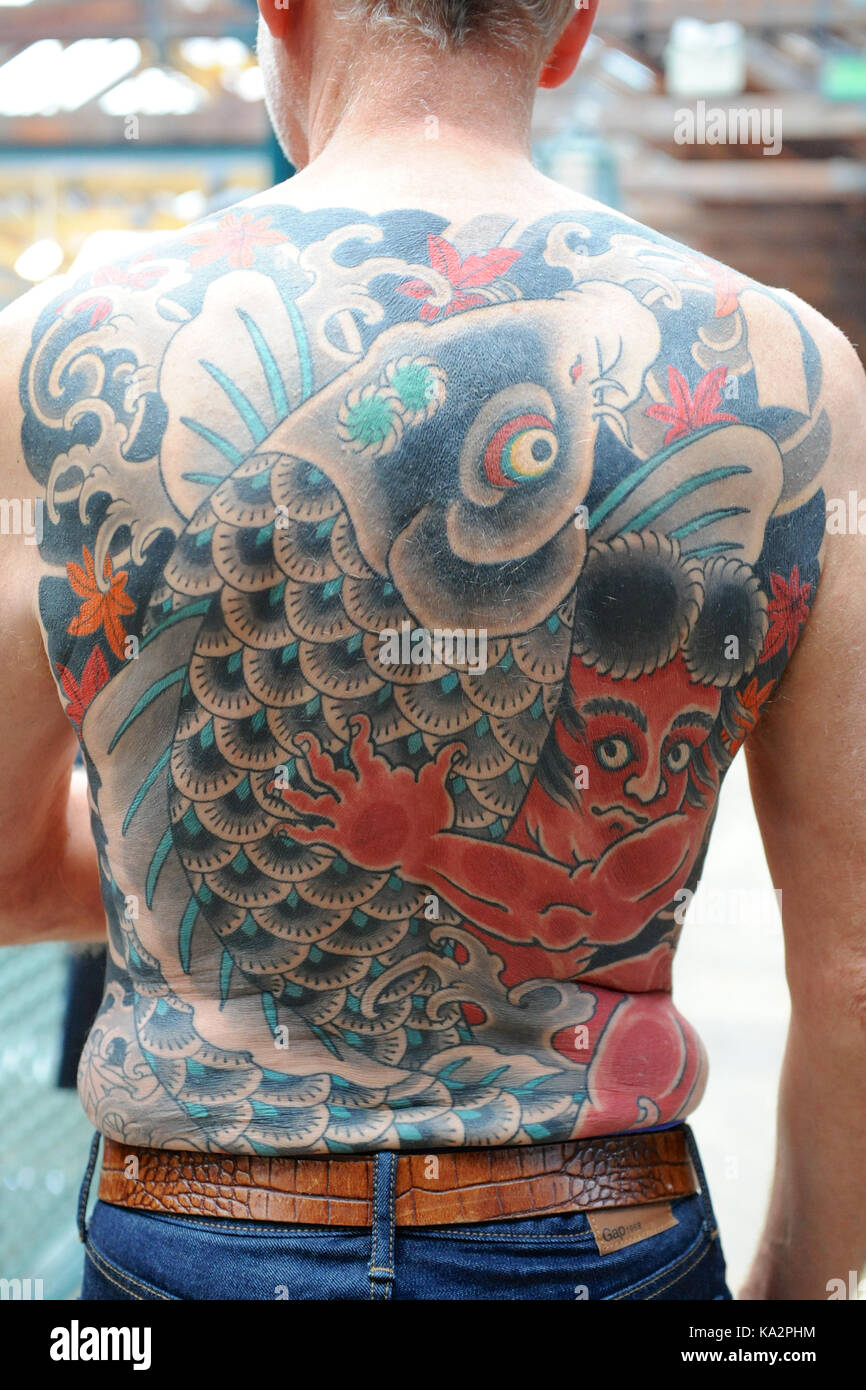 London, UK. 24th September, 2017. A man with a Japanese style body suit  tattoo at the 13th London International Tattoo Convention, which took place  over the weekend in Tobacco Dock, east London.