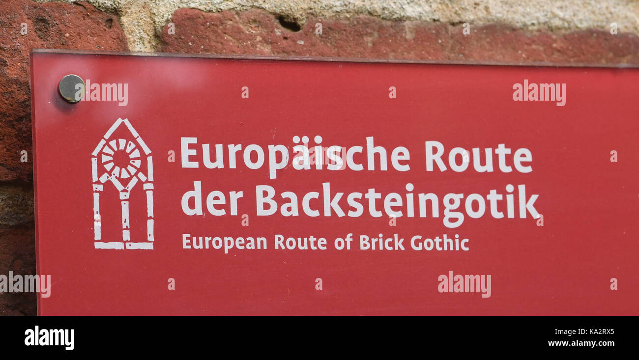 A sign reading "Europaeische Route der Backsteingotik" (lit. "European Route  of Brick Gothic") can be seen at the monastery ruin Eldena near Greifswald,  Germany, 20 September 2017. The monastery was founded by