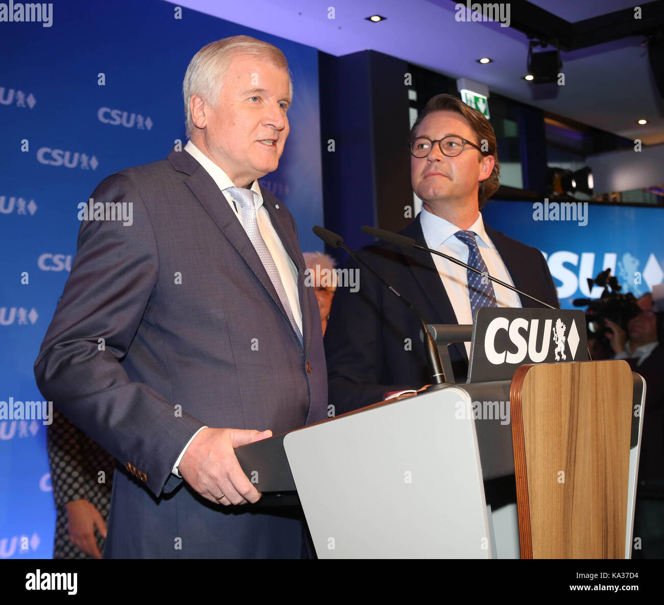 Munich, Germany. 24th Sep, 2017. Horst Seehofer (l.) and Andreas Scheuer (r.) After the election the leading bavarian party CSU (sister party of the CDU) held an election party. A few hundred guests attended the event. The CSU lost about 10% from the last result. CSU chairman Horst Seehofer held a speech, in which he admitted the heavy defeat. Credit: Alexander Pohl/Pacific Press/Alamy Live News Stock Photo