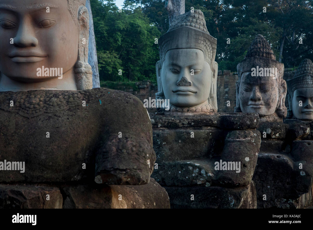 Detail, statues of Asuras on bridge of South Gate, in Angkor Thom, Siem ...