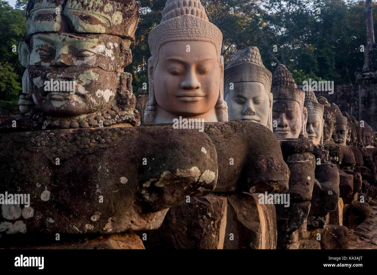 Detail, statues of Asuras on bridge of South Gate, in Angkor Thom, Siem ...