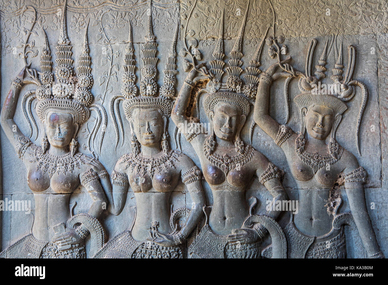 Apsara sculptures in bas-relief on the wall, in Angkor Wat, Siem Reap