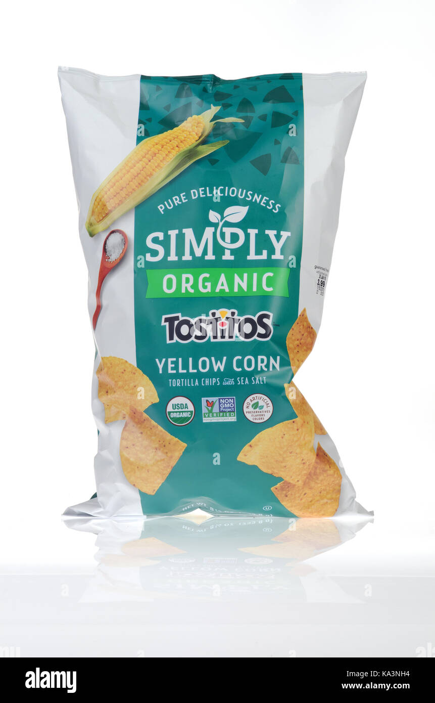 Bag of Frito-Lay Simply Organic Tostitos Yellow Corn Tortilla Chips on white background isolate, USA. Stock Photo