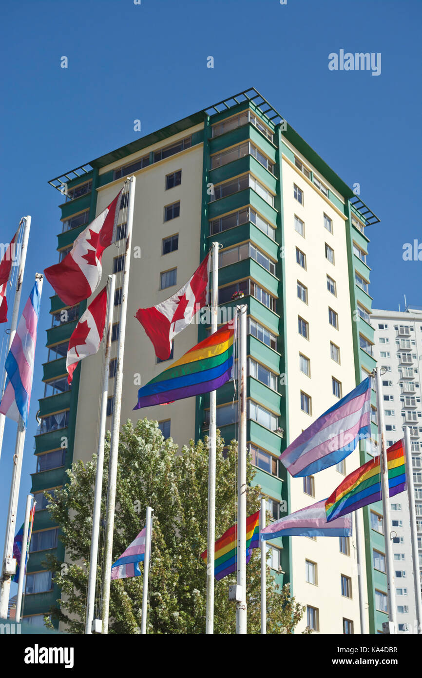 Canadian flags and gay pride rainbow flags in the West End of Vancouver near English Bay. Stock Photo