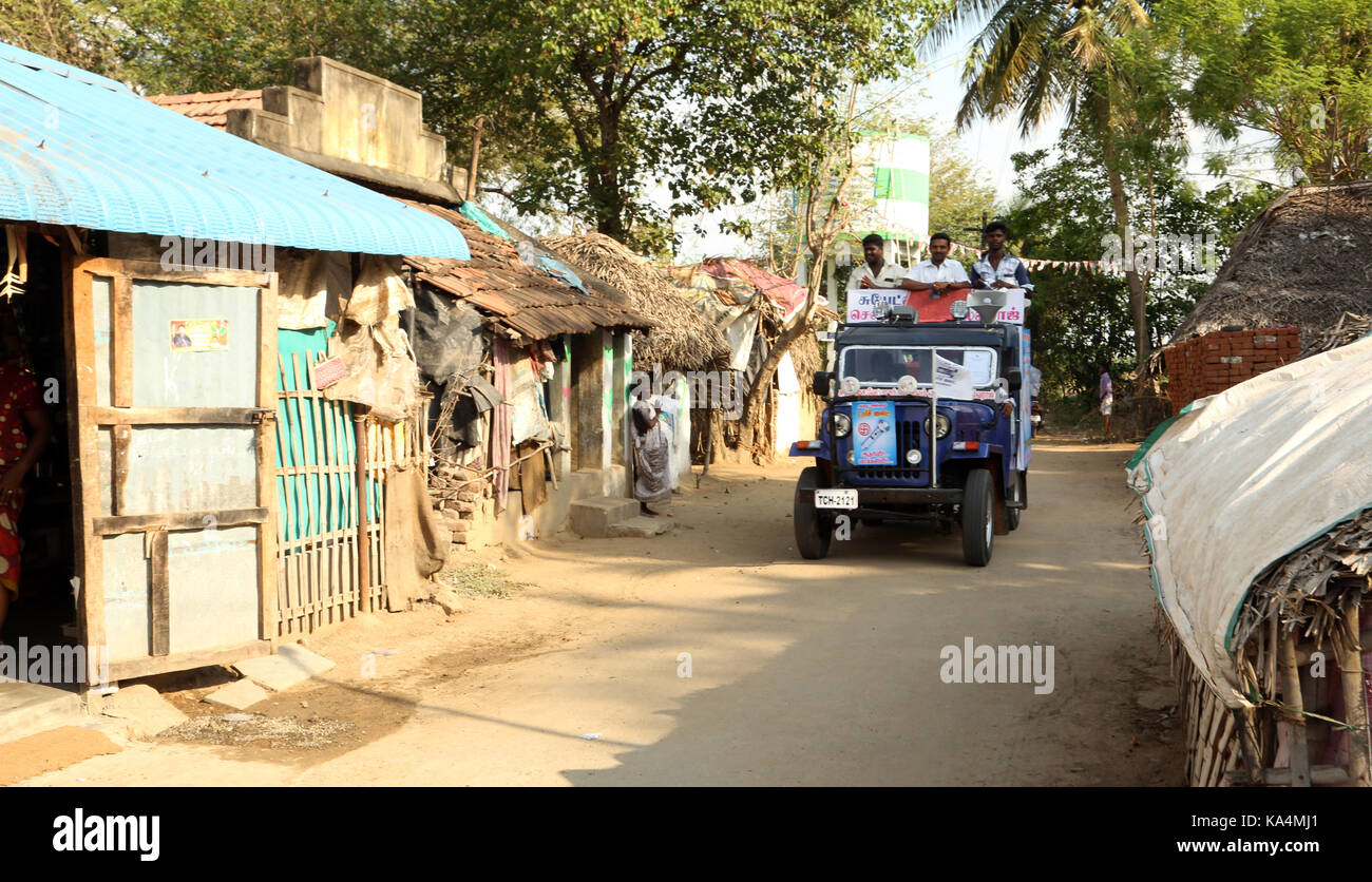 Young man riding a motorcycle on an open road,  SUYACHI MLA CANDIDATE PIRACHARAM of Nannilam, Tamilnadu, India. people bike ride Stock Photo