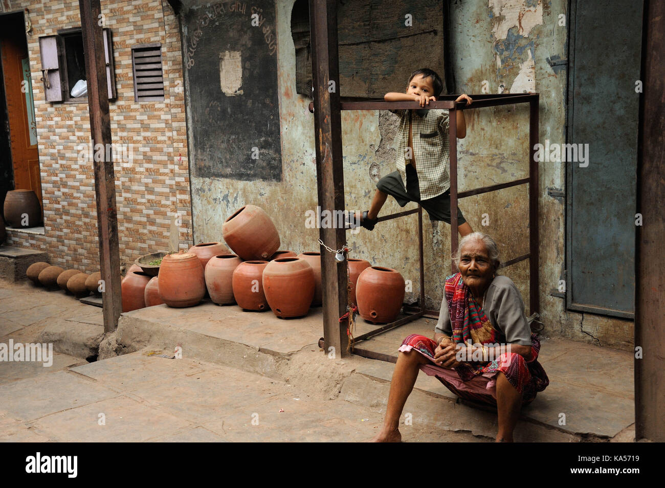 child playing dharavi slum, mumbai, maharashtra, India, Asia Stock Photo
