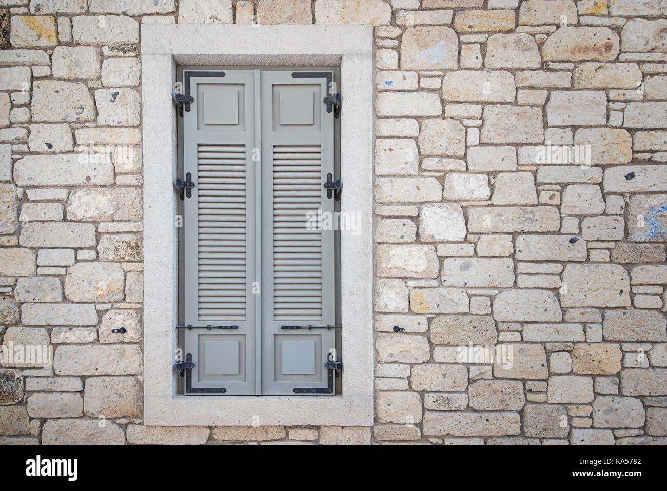 Old stone wall with grey window background Stock Photo - Alamy