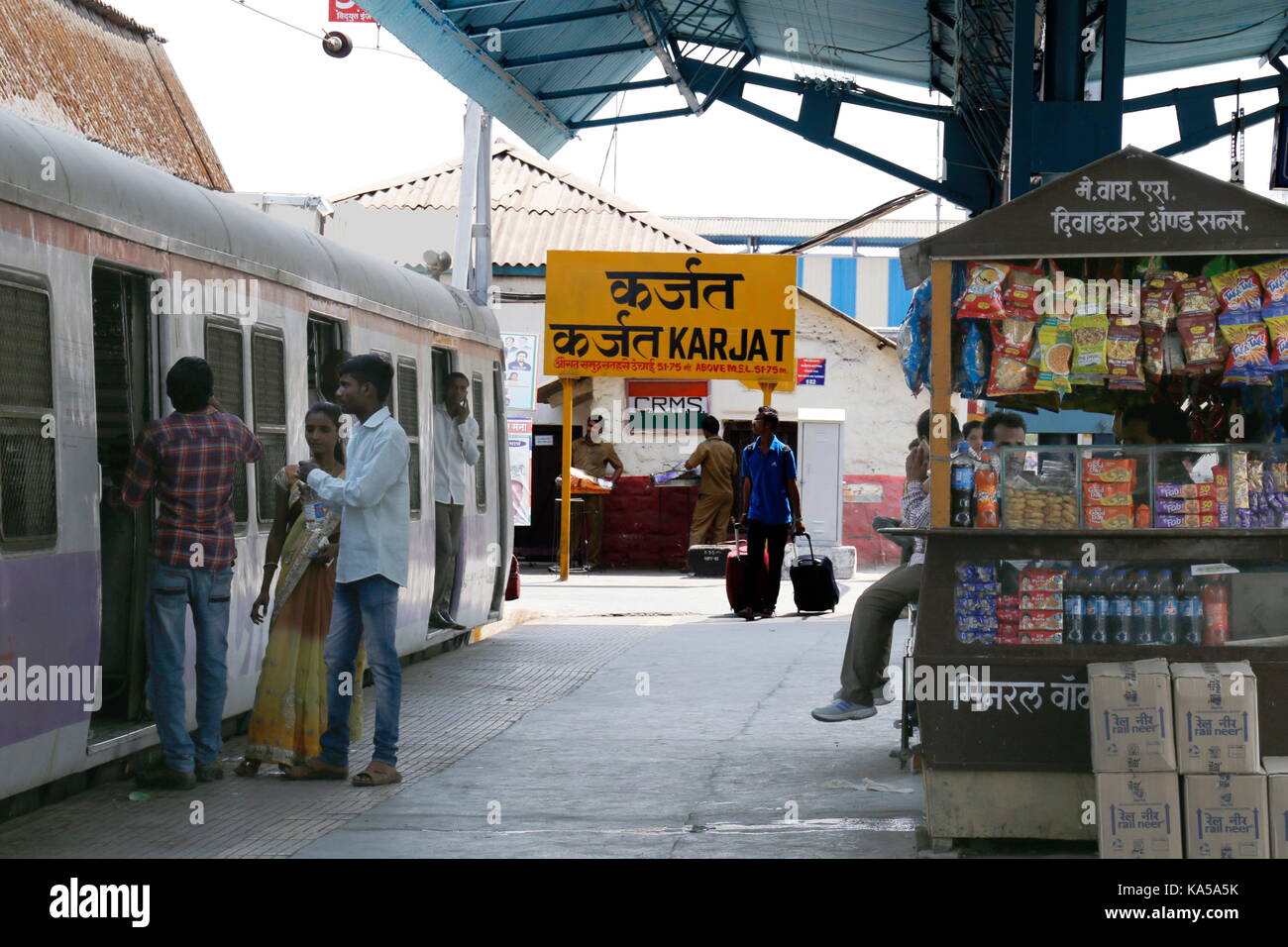 Karjat railway station, railway platform stall, sign board in English, Hindi, Marathi, Thane, Maharashtra, India, Asia Stock Photo