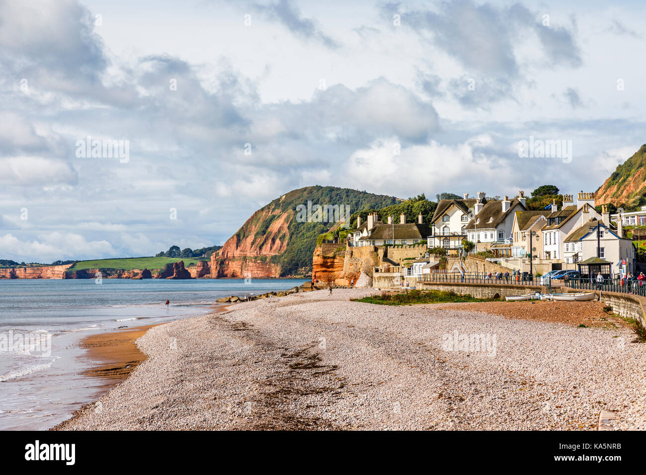 Seashore, stony beach and view of cliffs, Sidmouth, a coastal town and popular holiday resort on the English Channel coast, Devon, South West England Stock Photo