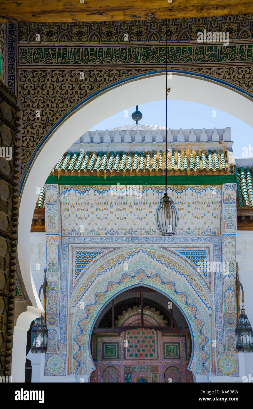 Elaborate and colorful mosque with many ornaments and carvings in Fes, Morocco, North Africa. Stock Photo
