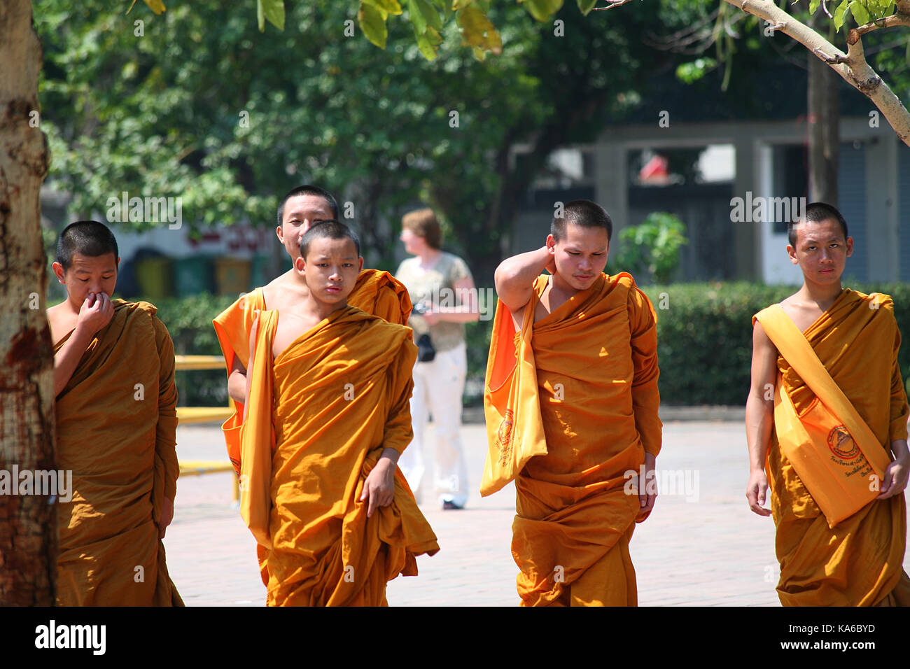 Daily life in a Buddhist monastery. The monks go to the city to collect  alms Stock Photo - Alamy