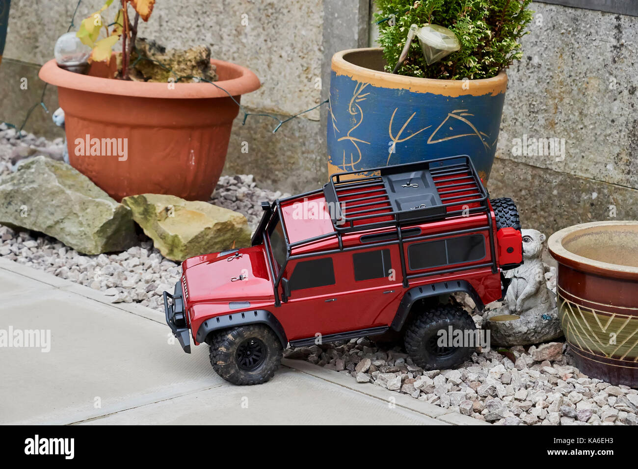 Model Radio Controlled Land Rover being operated by a teenager. Stock Photo