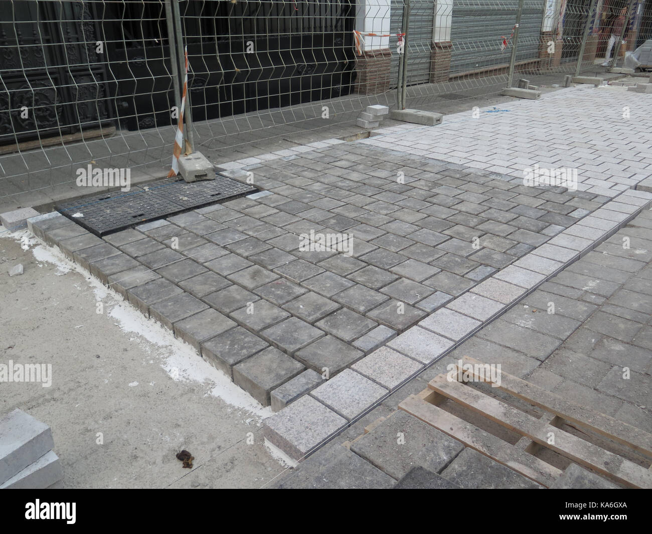 Square paving stones awaiting grouting in village street in Andalusia