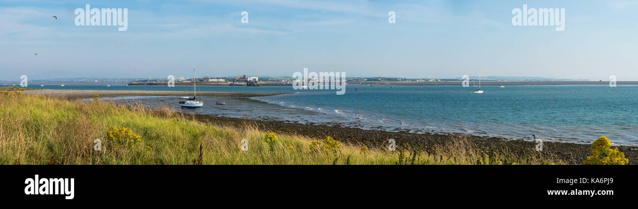 A panoramic photograph taken from Piel Island looking towards Roa Island and Barrow-in-Furness. Stock Photo