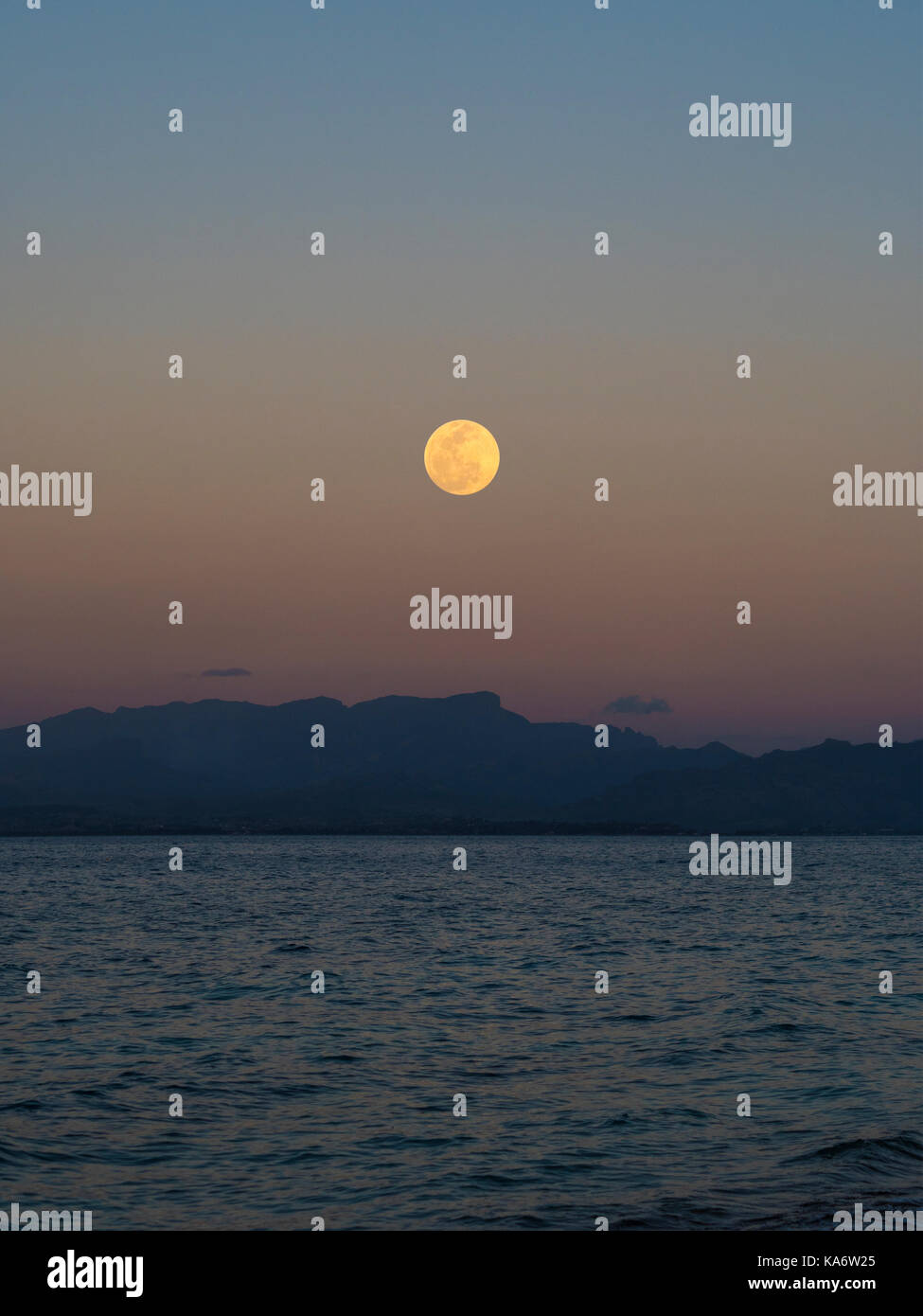 Beautiful Moon Setting over Bounty Island, Fiji Stock Photo - Alamy