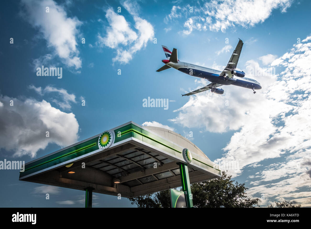 Low flying jet aircraft descending towards Heathrow Airport, Terminal 4