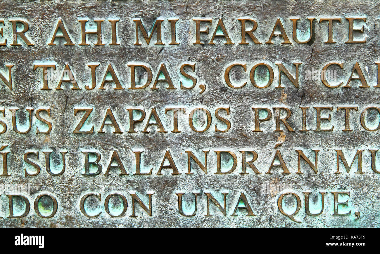 Spanish words on bronze Stock Photo