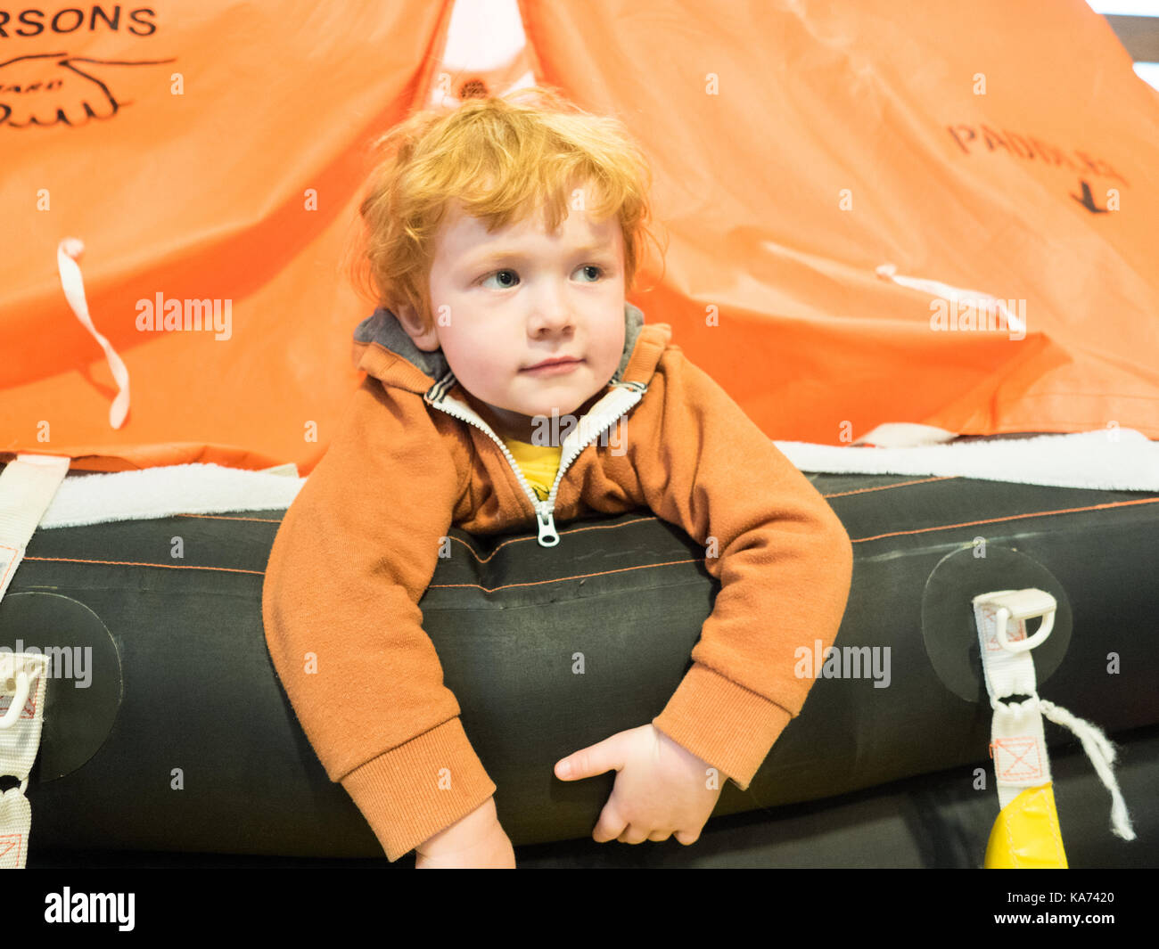 Boys playing on raft hi-res stock photography and images - Alamy