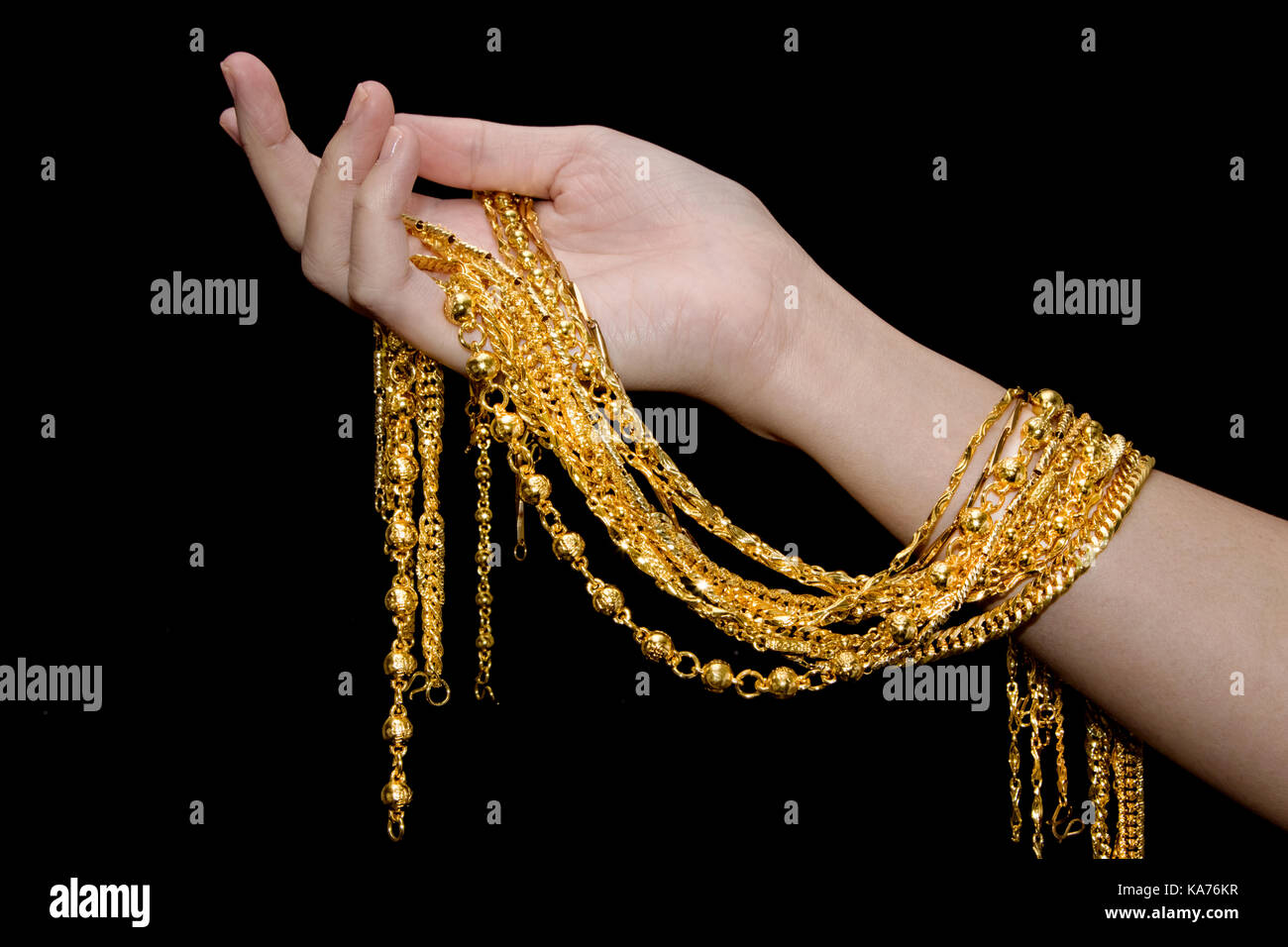 Gold Neck Lace Gold Jewelry In Woman S Hands Stock Photo