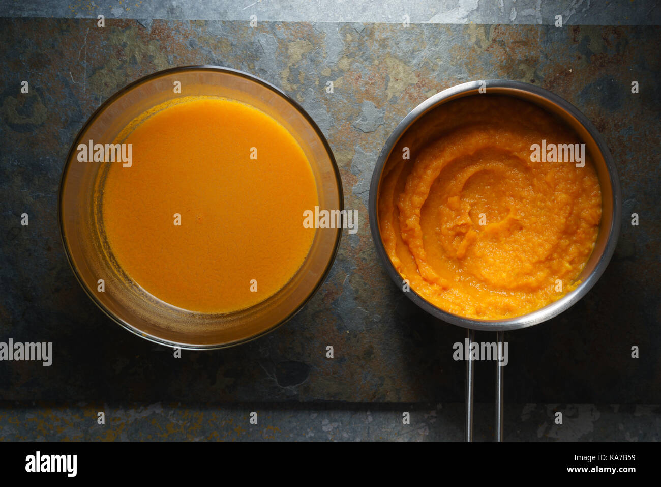 Pumpkin soup in a glass bowl and sauerkraut with pumpkin puree horizontal Stock Photo