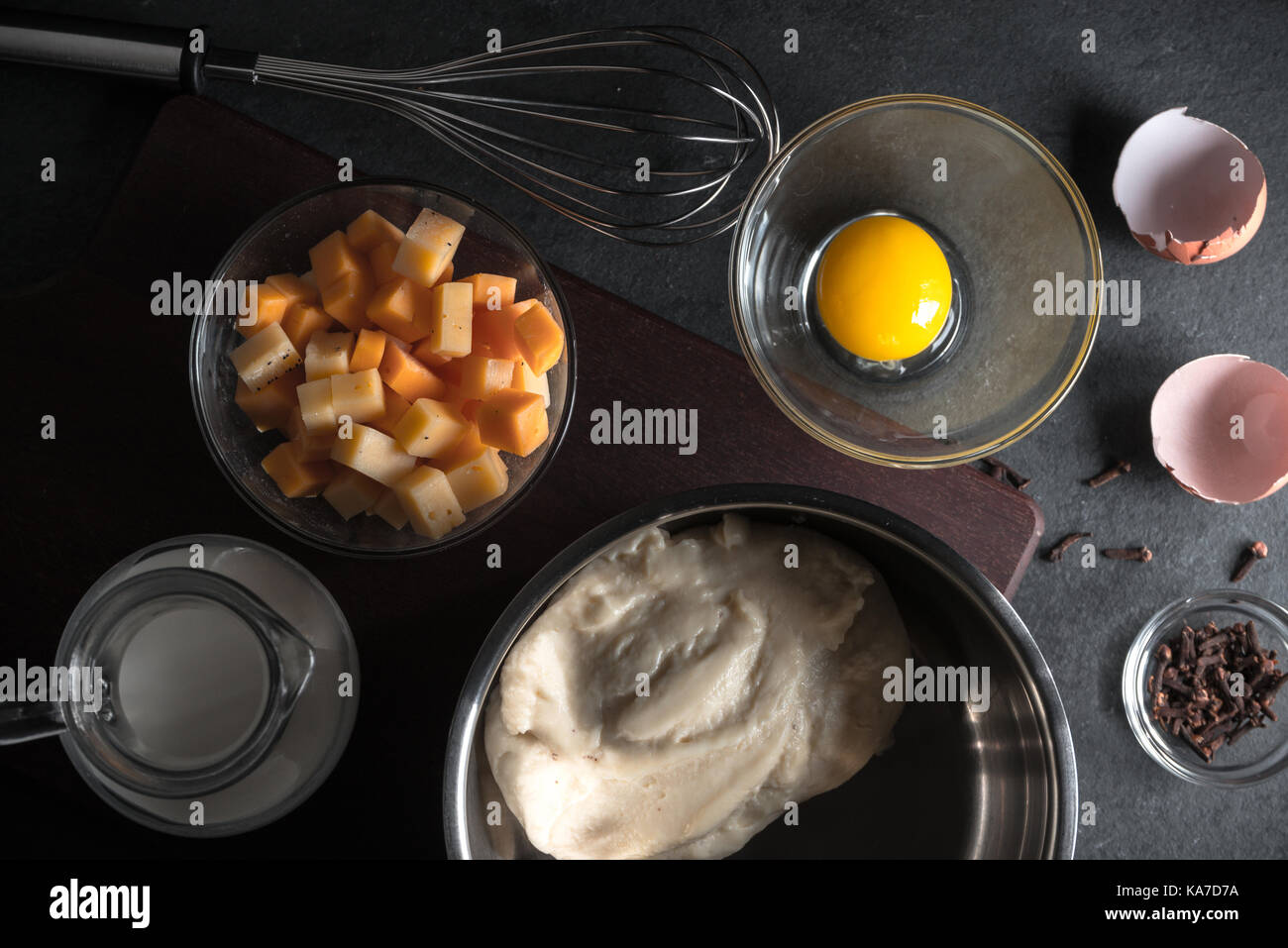Cooking mornay sauce, cheese and eggs horizontal Stock Photo