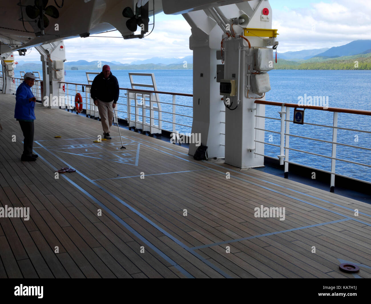 Playing Deck Quoits (Shuffleboard), Neuw Amsterdam, Alaska, USA Stock Photo Alamy