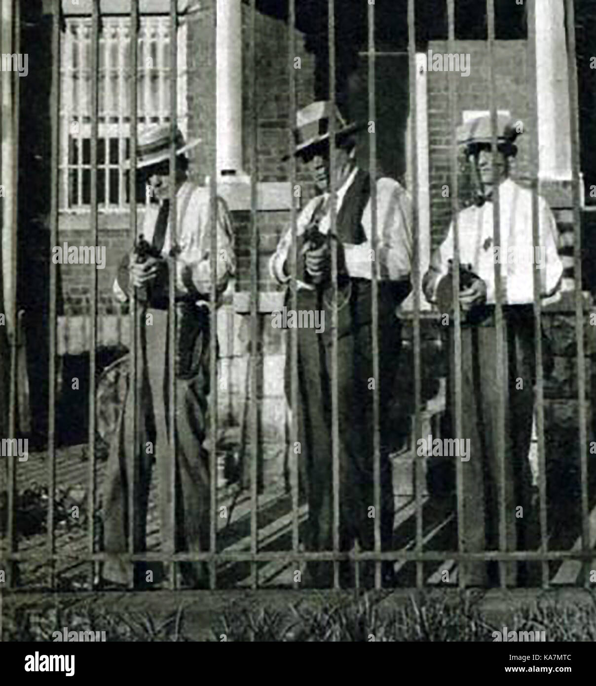 portraits of Deputy Sheriff Jesse Wheat, jailer W Lovan and deputy sheriff  C W Smith on guard at Benton gaol, Illinois USA protecting it from a gang who were to free the 'Gangster King' Charlie Birger Stock Photo