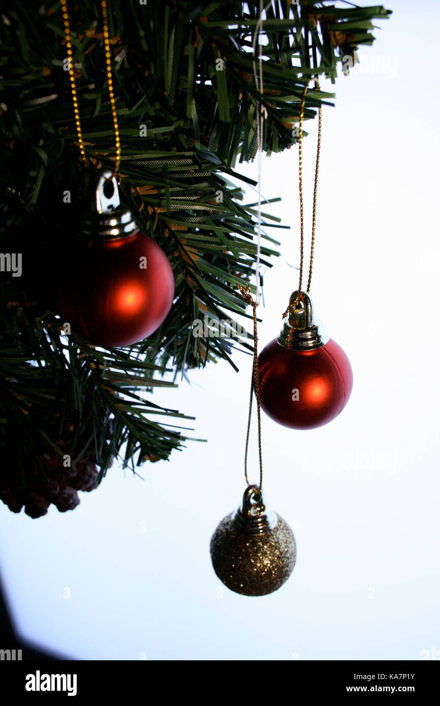 Hanging gold baubles hi-res stock photography and images - Alamy