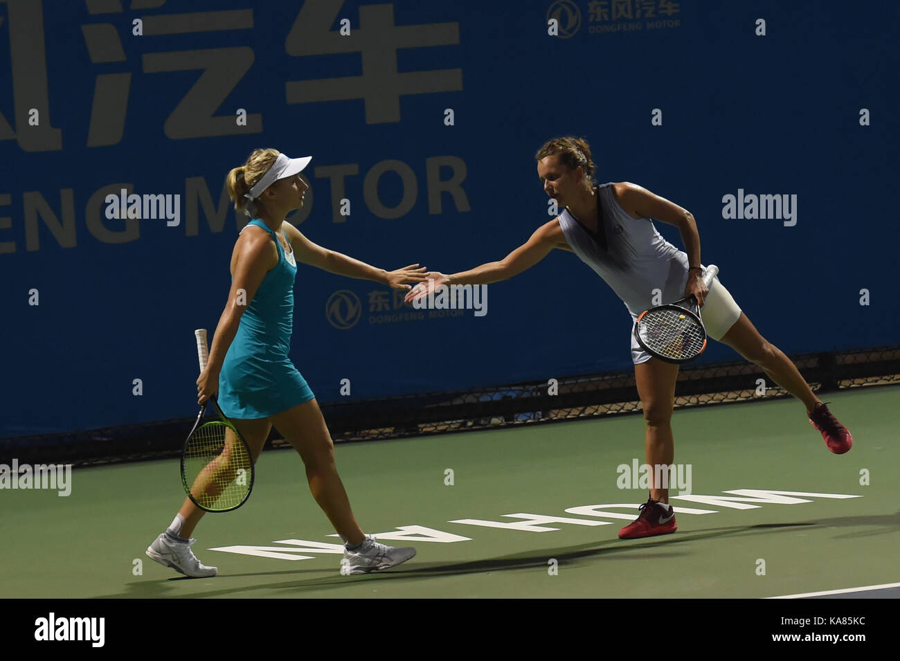 Wuhan, China. 25th September, 2017. Daria Gavrilova(L) of Australia and Barbora Strycova of Czezh Republic compete during the doubles first round match against Nicole Melichar of the United States and Anna Smith of Britain at 2017 WTA Wuhan Open in Wuhan, capital of central China's Hubei Province, on Sept. 25, 2017. Nicole Melichar and Anna Smith won 2-0. Credit: Xinhua/Alamy Live News Stock Photo
