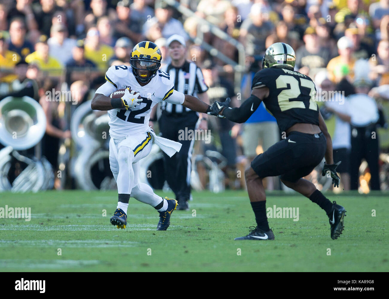 West Lafayette, Indiana, USA. 23rd Sep, 2017. Michigan running back Chris Evans (12) runs with