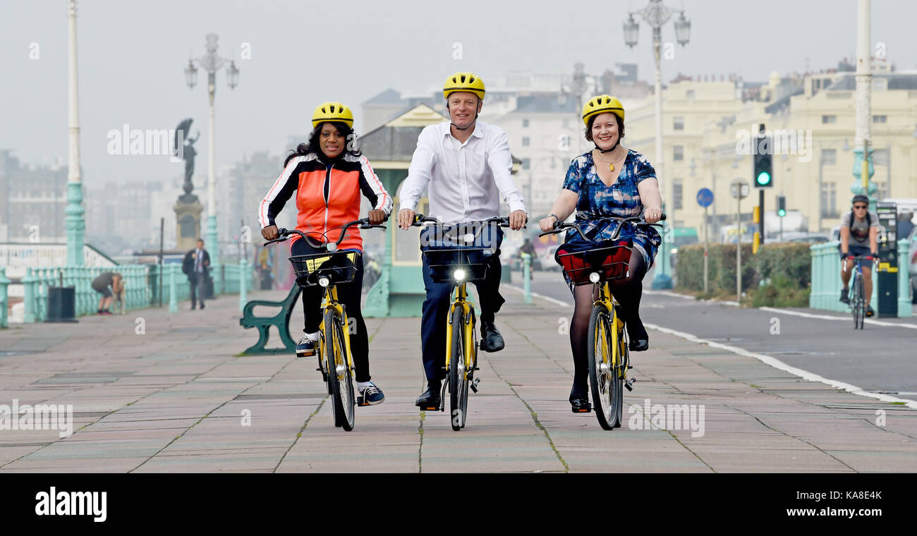 Brighton, UK. 26th Sep, 2017. Labour Party MPs from left Eleanor Smith, Luke Pollard and Meg Hillier take part in a cycle ride along Brighton seafront on ofo station-free bikes to raise money for the British Heart Foundation during this weeks Labour Party Conference in the city Credit: Simon Dack/Alamy Live News Stock Photo