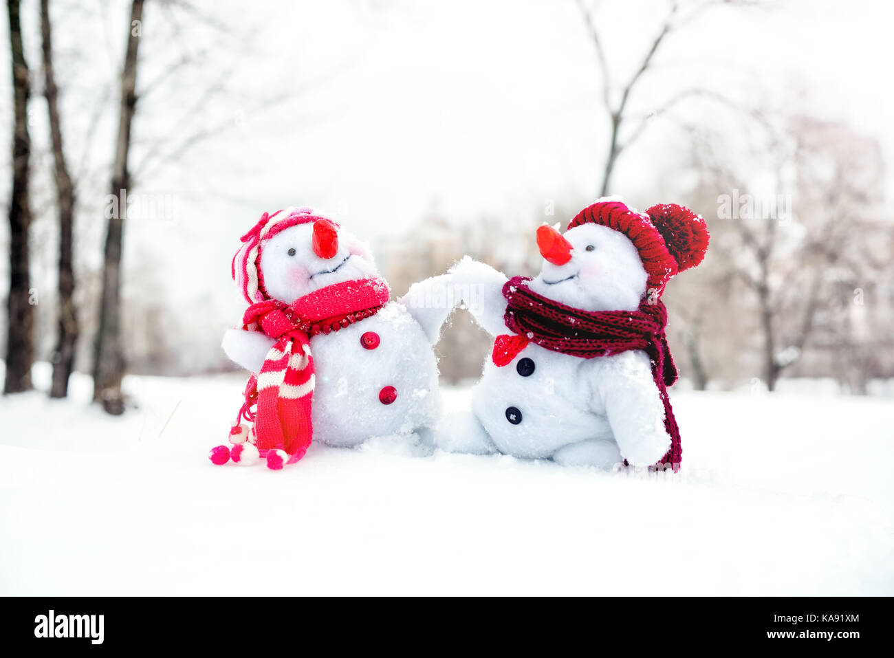 Couple of snowmen Stock Photo - Alamy