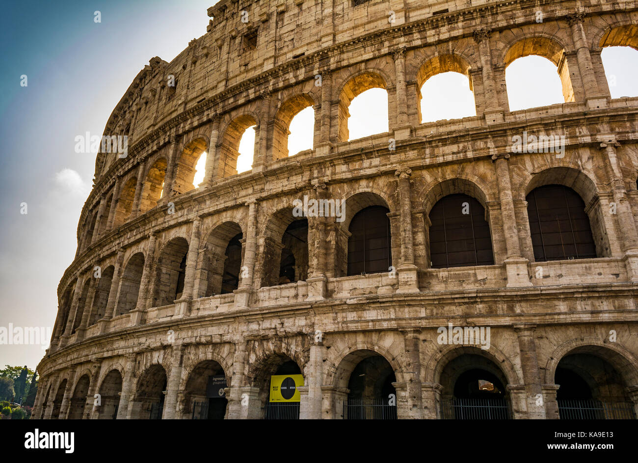 Colosseum closeup view, the world known landmark of Rome. Also known as the Flavian Amphitheatre is an oval amphitheater in the center of the city of Stock Photo