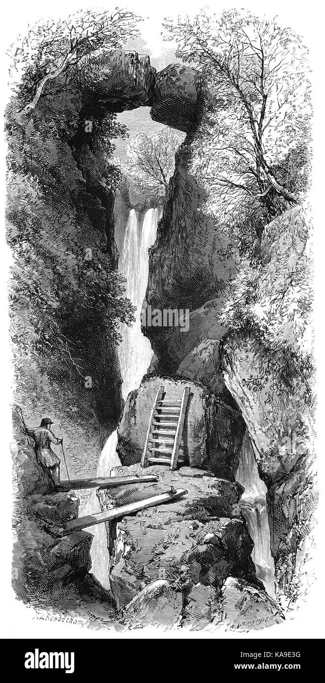 1870: The 40 foot  Dungeon Ghyll Force, a waterfall fed by Dungeon Ghyll. This deep ravine was loved by Victorian poets and described in Wordsworth's 'The Idle Shepherd-Boys'. Near Great Langdale Valley, the Lake District, Cumbria, England Stock Photo