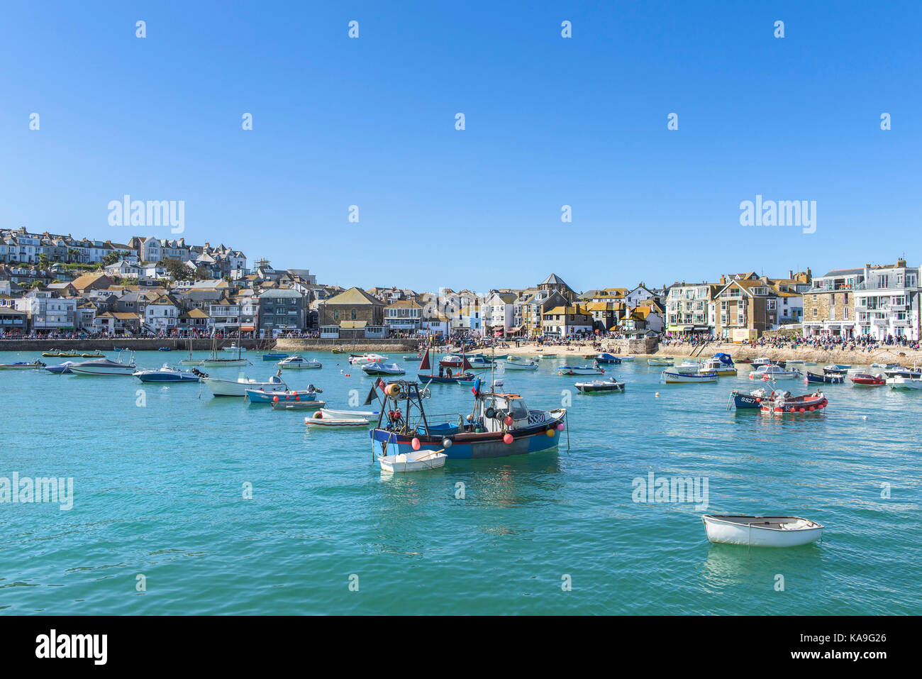 St Ives various boats and dinghies moored at high tide in St Ives