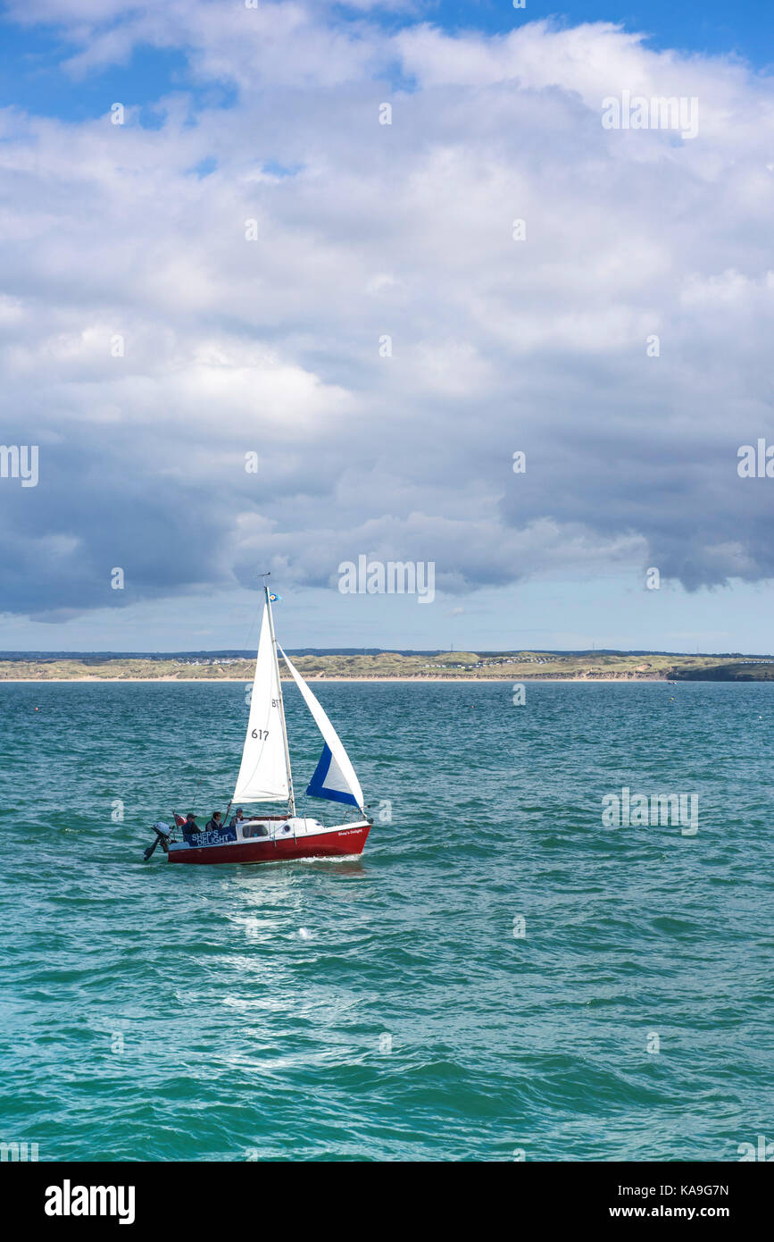 St Ives Bay - a small sail boat in St Ives bay in Cornwall. Stock Photo
