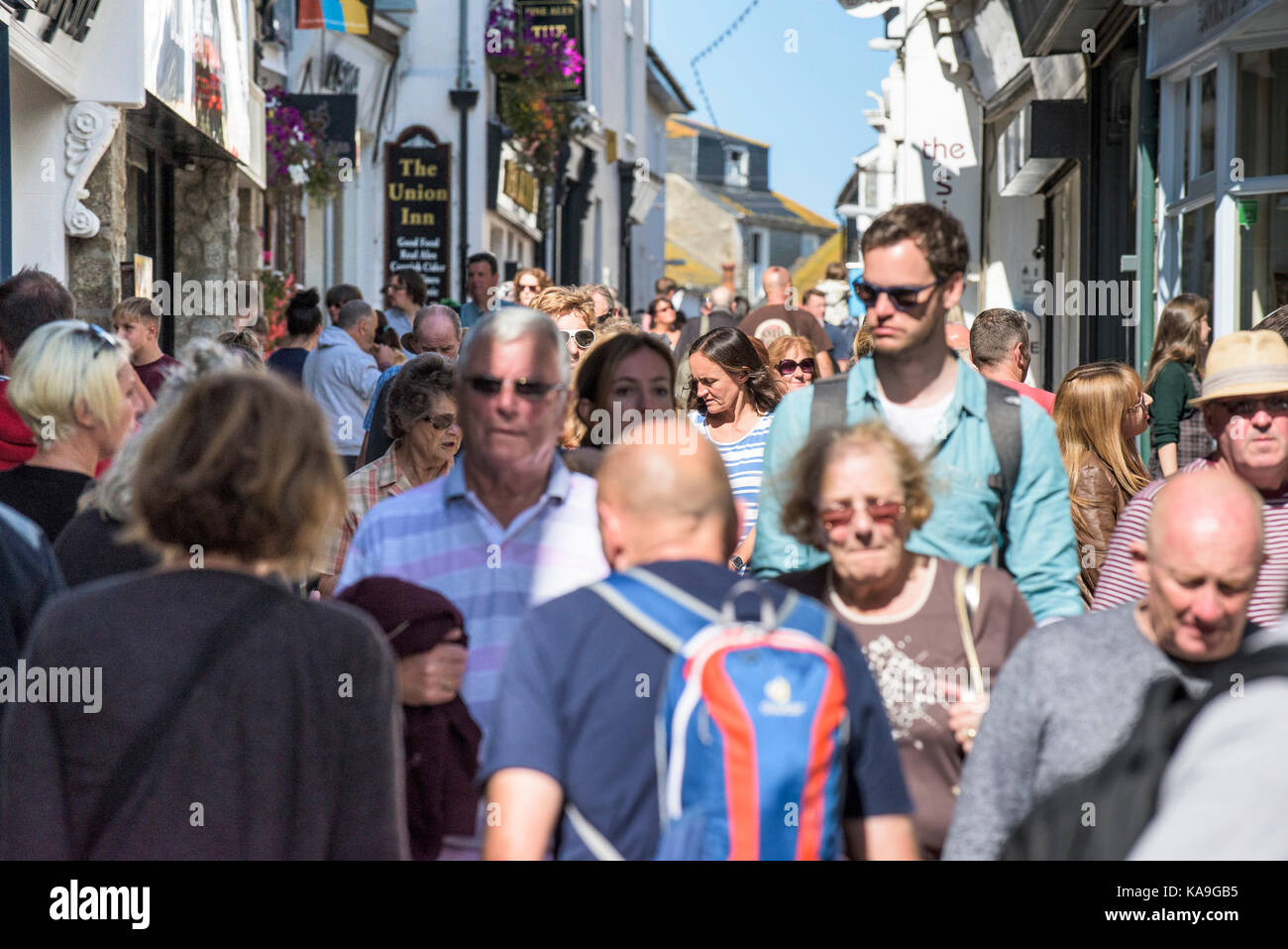 St Ives - a busy street scene in the picturesque St Ives town centre in Cornwall. Stock Photo