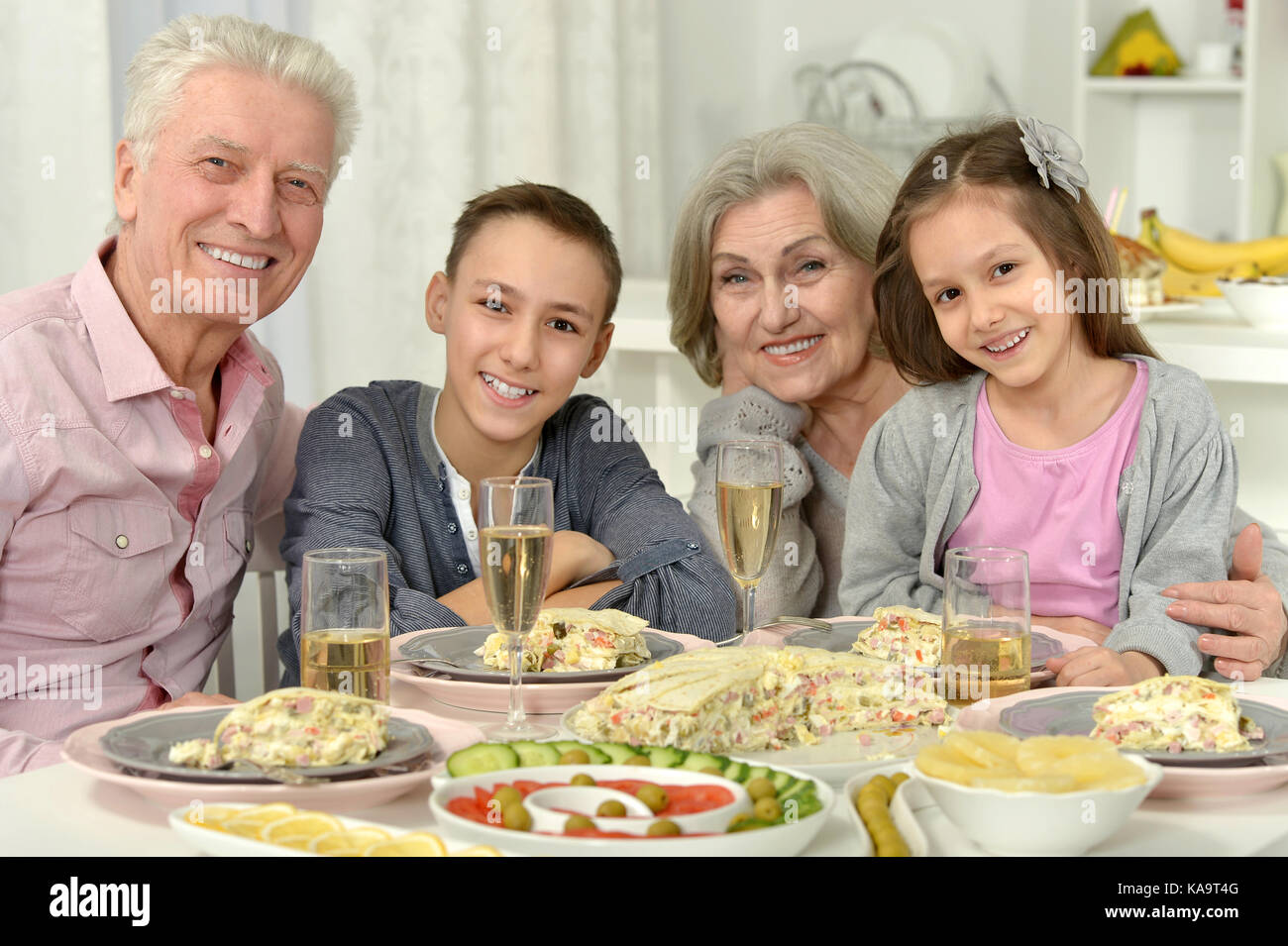 Brother and sister having breakfast Stock Photo - Alamy