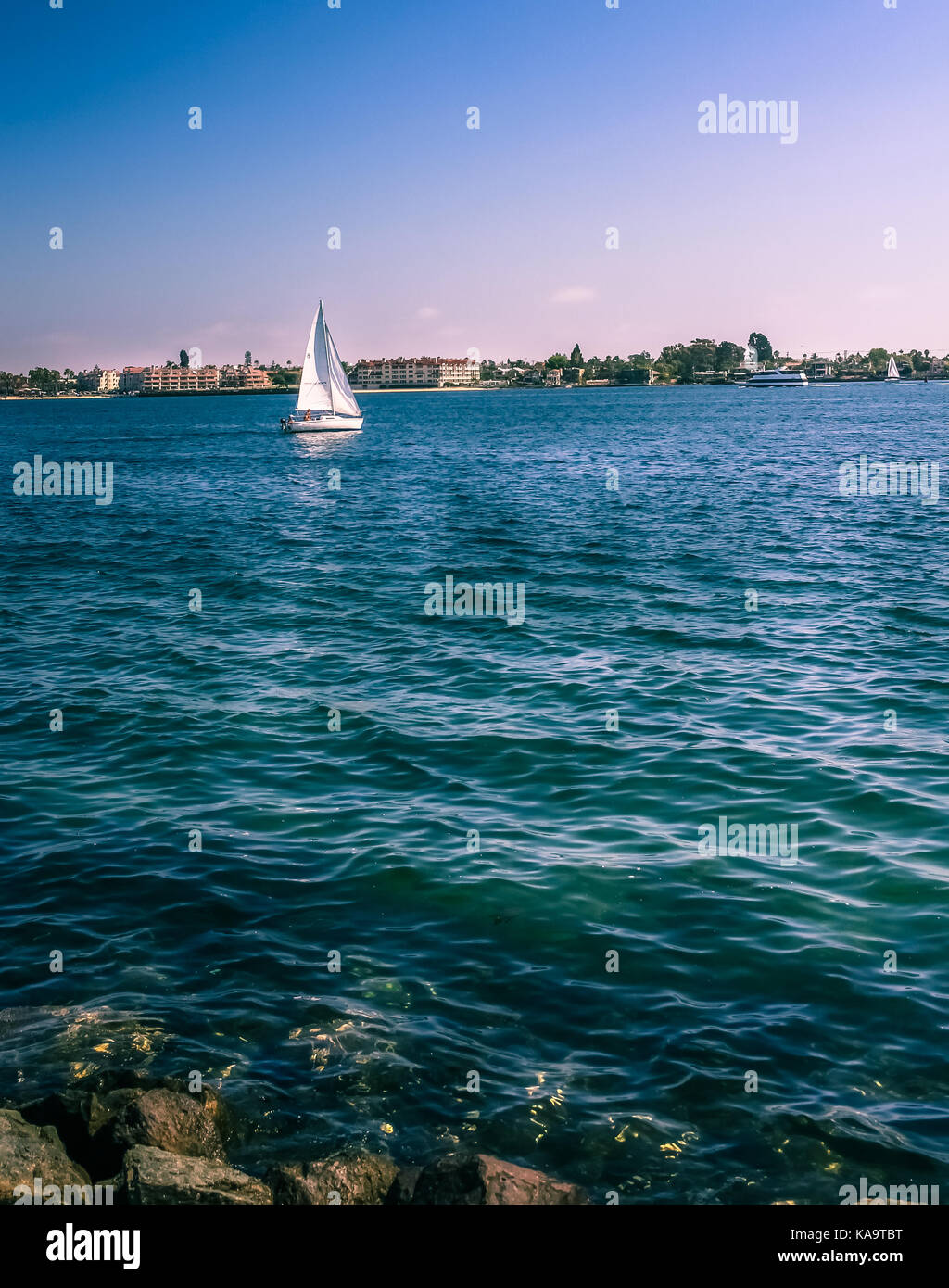 SAN DIEGO - JULY 13, 2016 - A sailboat coasting off of San Diego Bay on July 13, 2016. Stock Photo