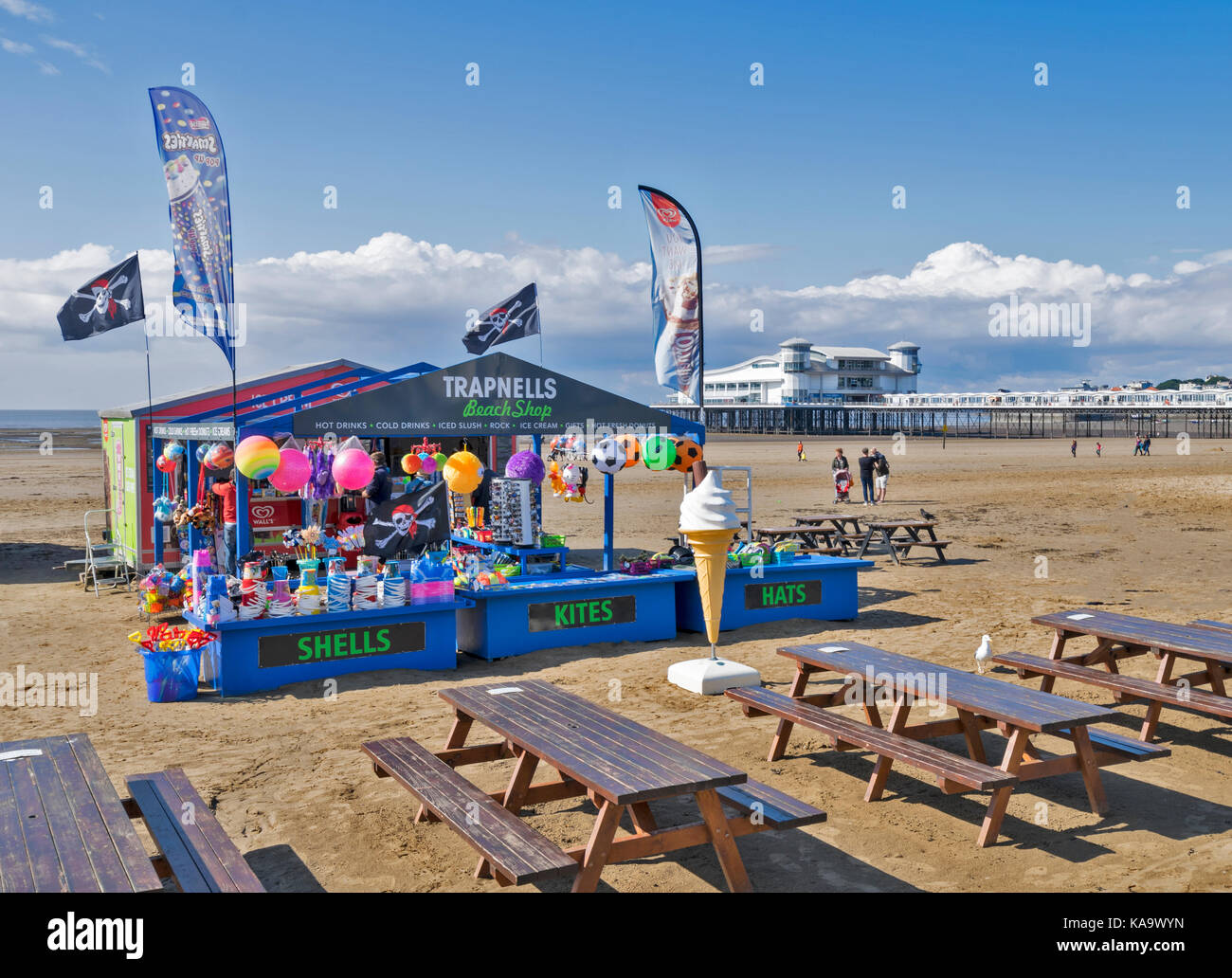 WESTON SUPER MARE SOMERSET ENGLAND A SUNNY DAY WITH A SHOP ON THE SANDY