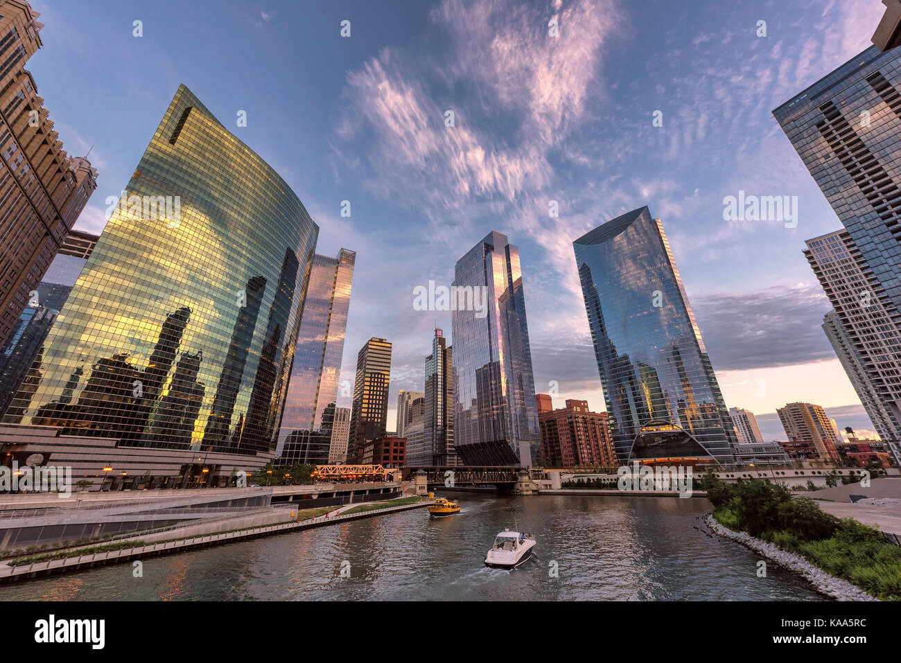 Chicago downtown and Chicago River with bridges during sunset. Stock Photo