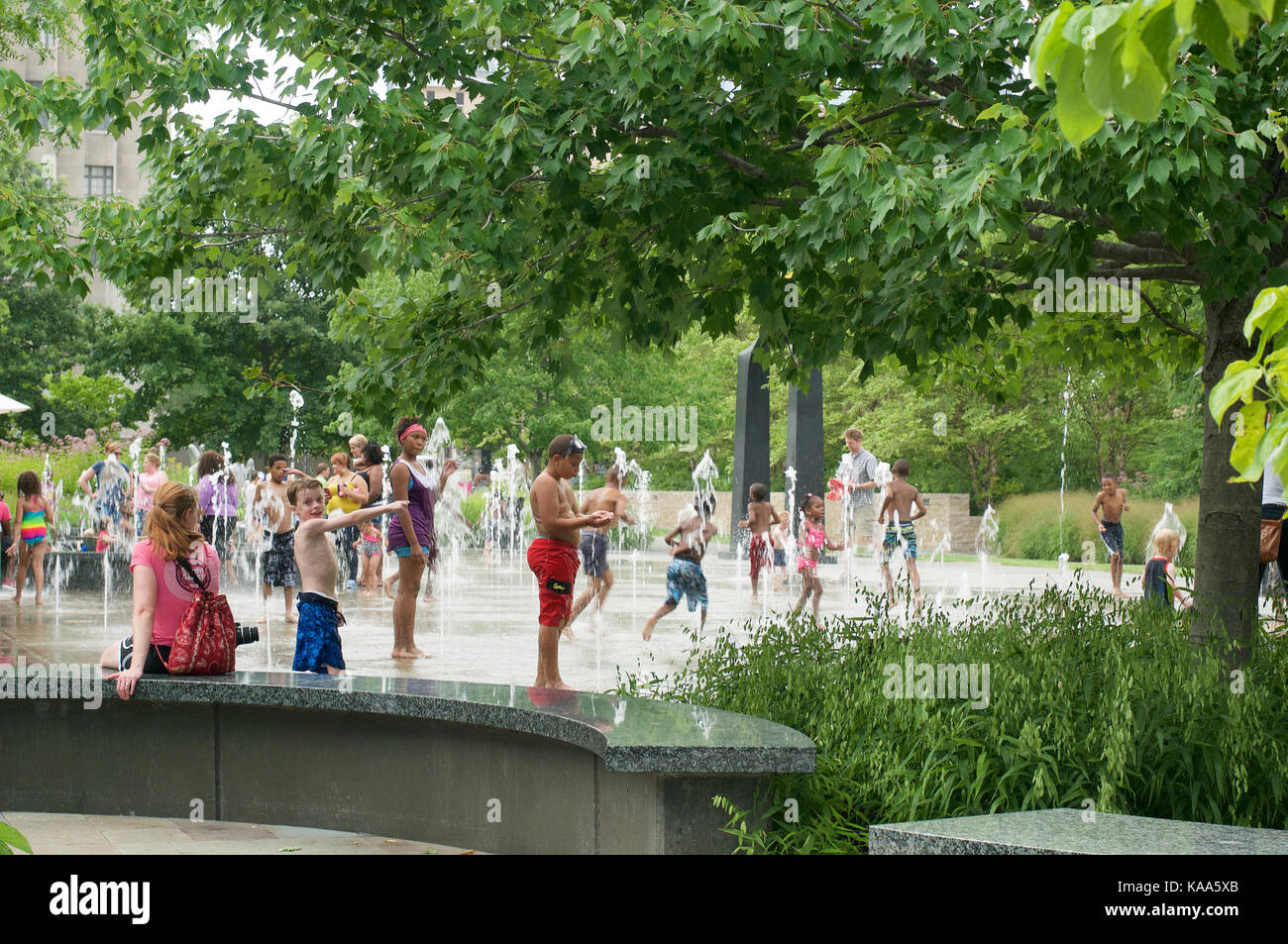 Children playing in the fountains in Downtown St Louis, Missouri, USA