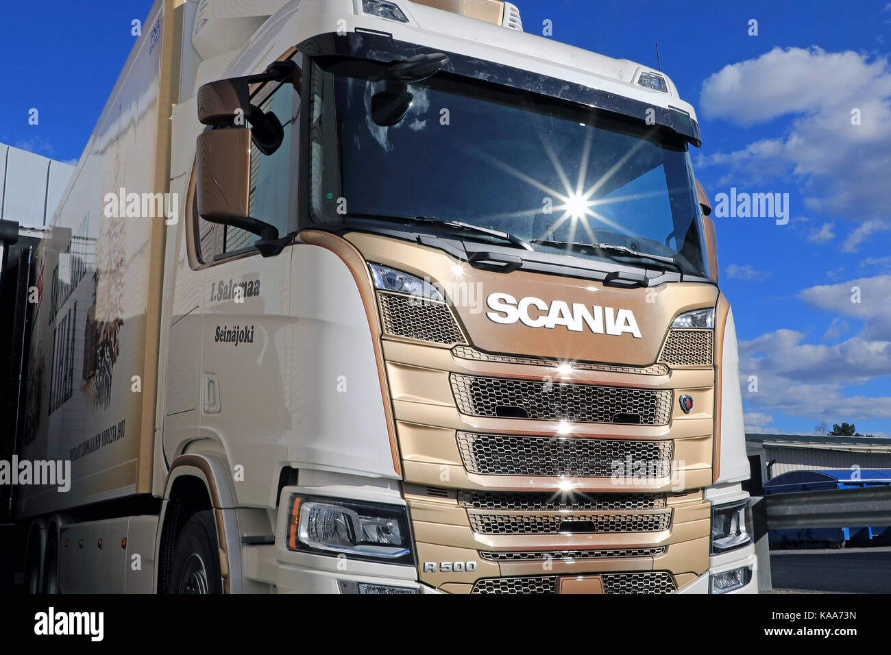 FORSSA, FINLAND - MAY 1, 2017: Detail of the stylish Next Generation Scania R500 of I Salomaa for transporting foodstuff at the loading zone of a ware Stock Photo