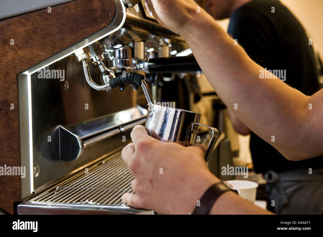 An industrial coffee machine prepares a morning coffee Stock Photo Alamy