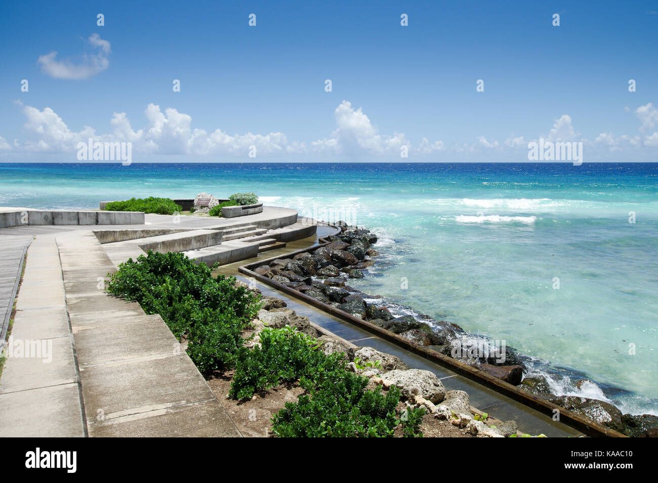 Richard Haynes Boardwalk running along Hastings Beach on the west coast of Barbados Stock Photo